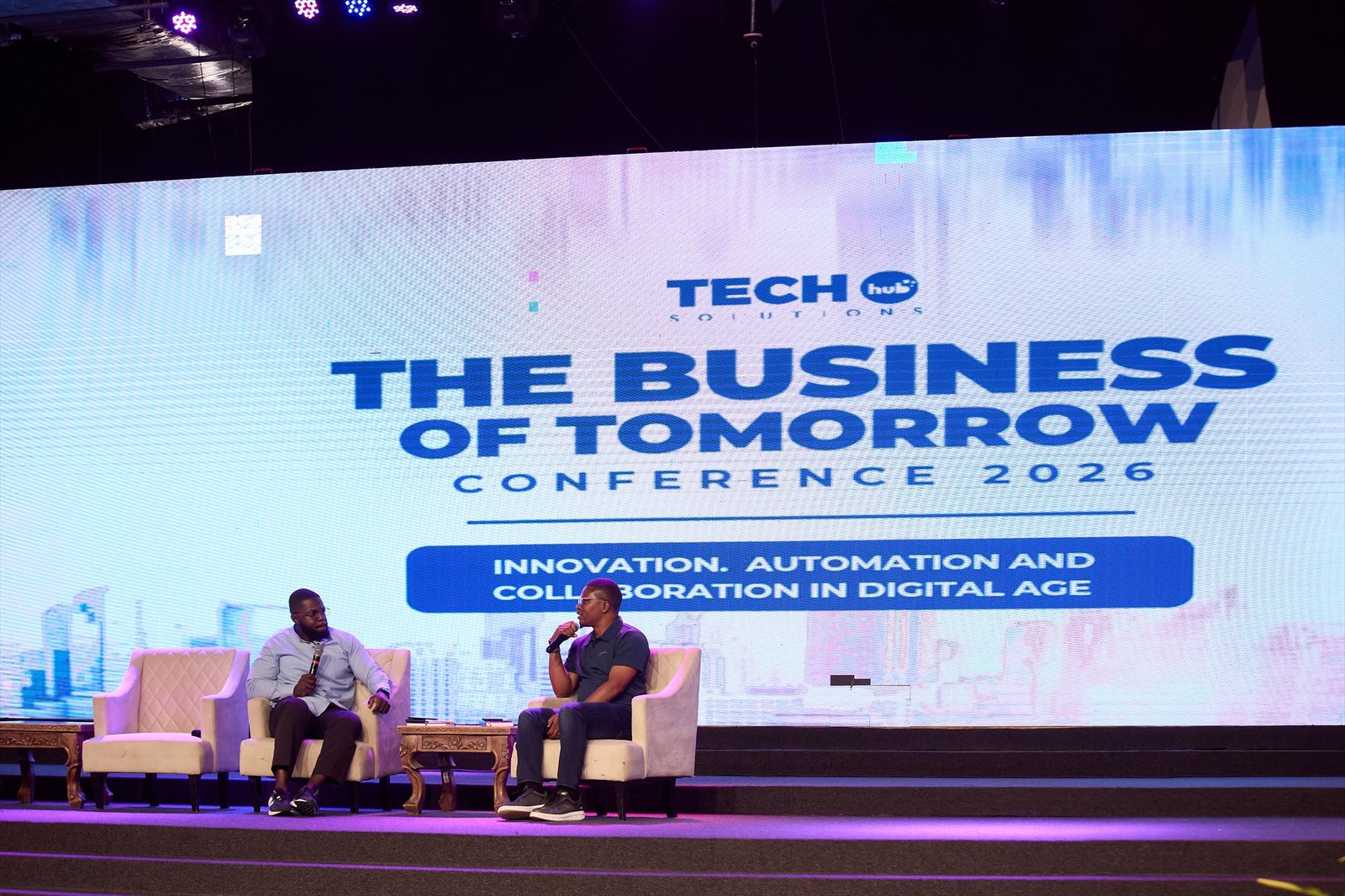 Fireside chat on stage at The Business of Tomorrow Conference 2026 by TechHub Solutions, themed Innovation, Automation and Collaboration in Digital Age